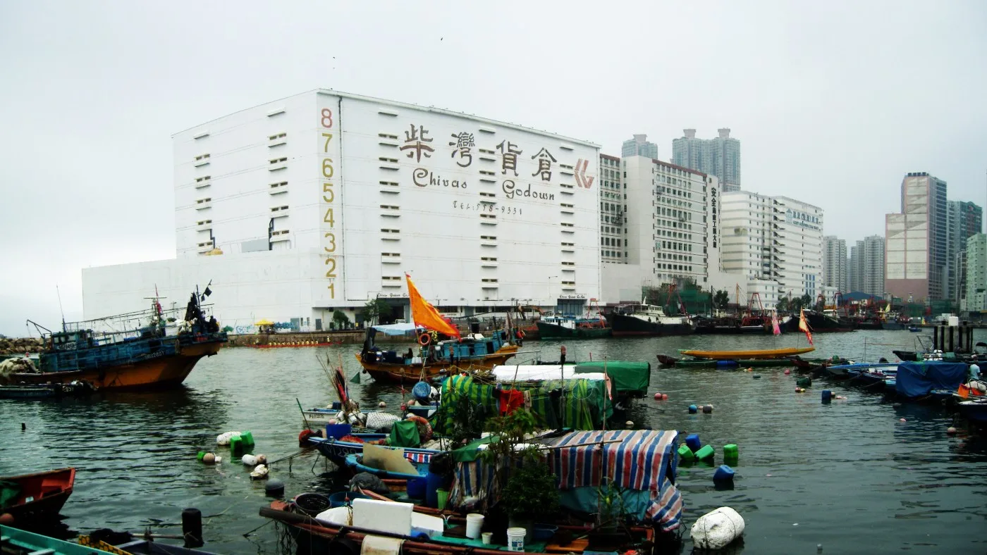 Dragon boats racing across the water during the Dragon Boat Festival