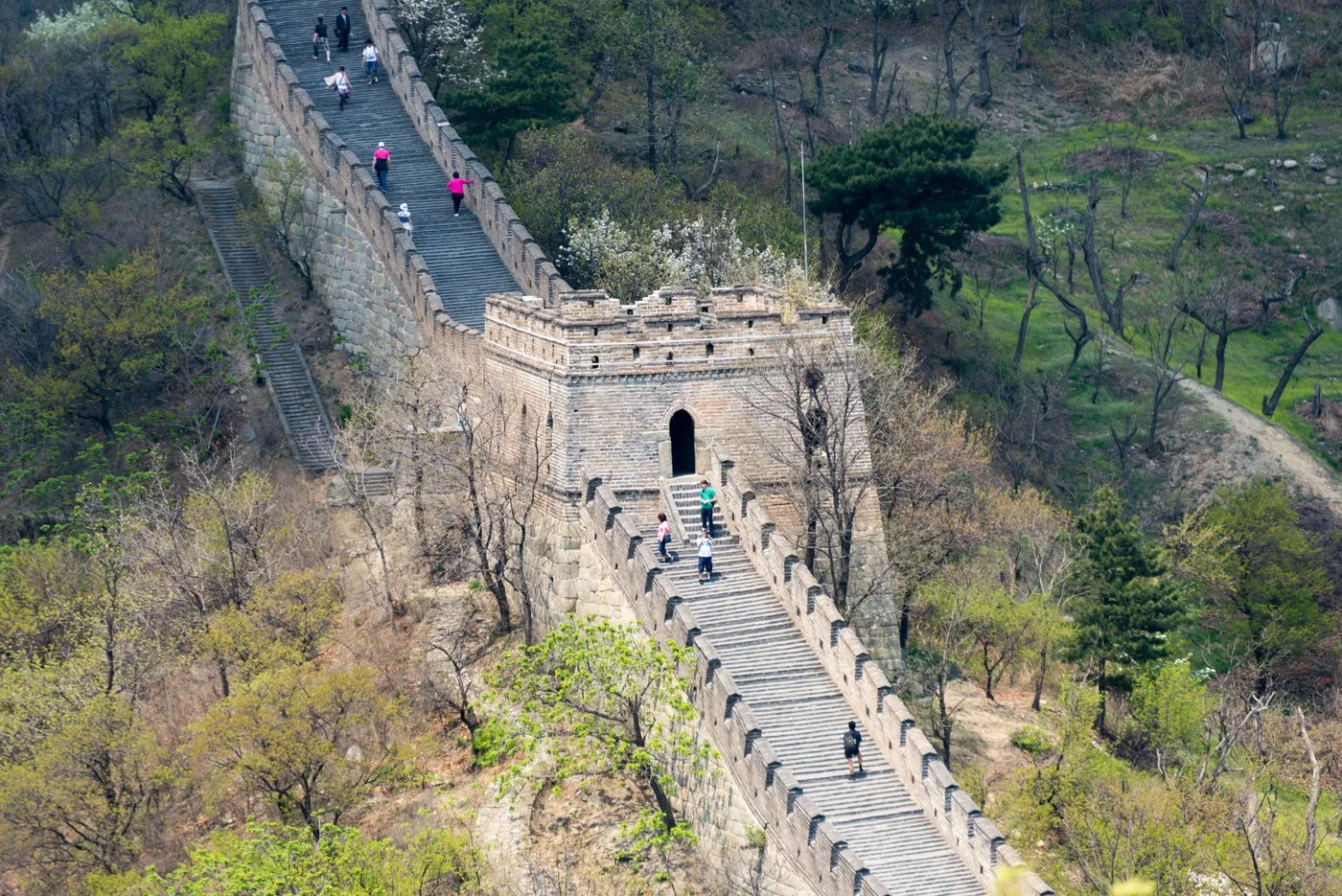 The Great Wall at Mutianyu winding over forested hills during the Labor Day holiday